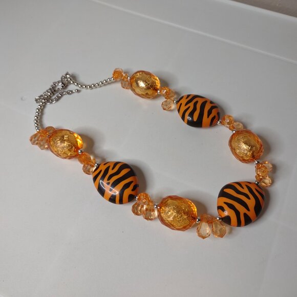 21 Inch Orange Plastic Bead Necklace With Tiger Stripes - Picture 3 of 12